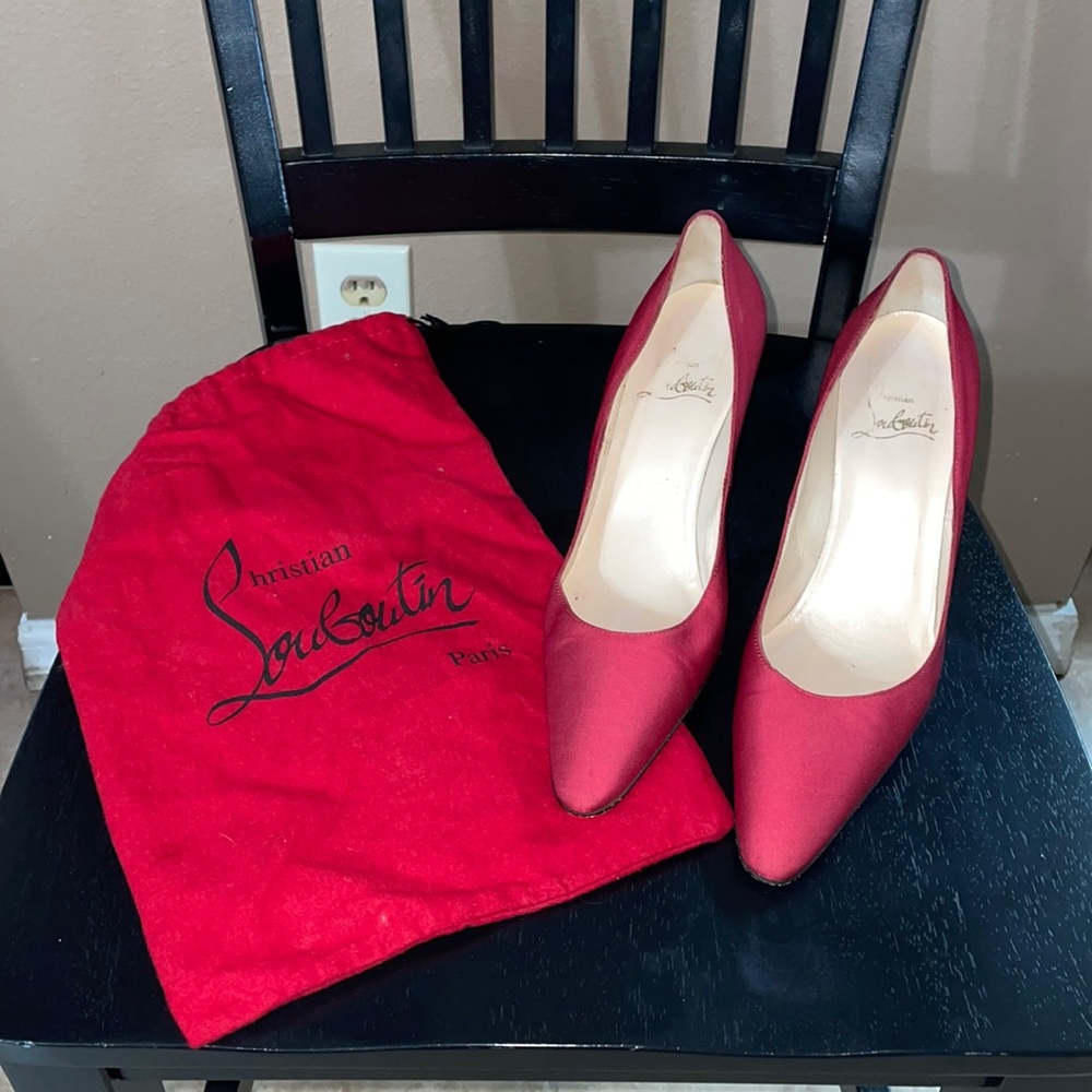 Red satin Christian Louboutin heels